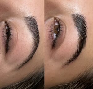 A woman with long, thick eyelashes and brown brows.