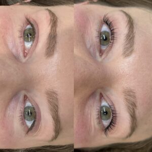 A woman with blue eyes and brown hair.