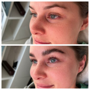 A woman with blue eyes and brown hair.