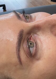 A close up of the eyes and brows of a person