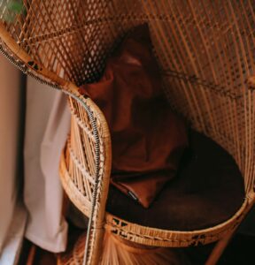 A basket with some blankets in it