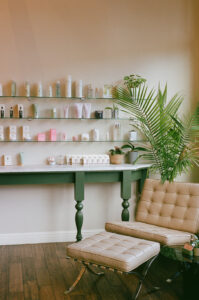 A room with shelves and plants in it