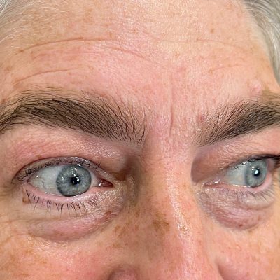 A close up of an older person 's eyes