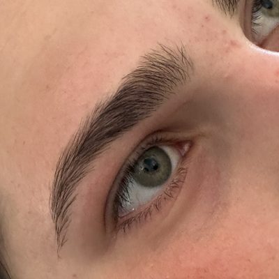 A close up of the eyes and brows of a person